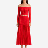RED CROP TOP WITH POMPOMS AND RIBBONS