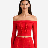 RED CROP TOP WITH POMPOMS AND RIBBONS