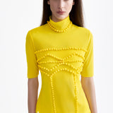 SIGNATURE TOP WITH POM-POM DETAILS