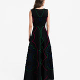 BLACK NEOPRENE MAXI DRESS WITH POMPONS